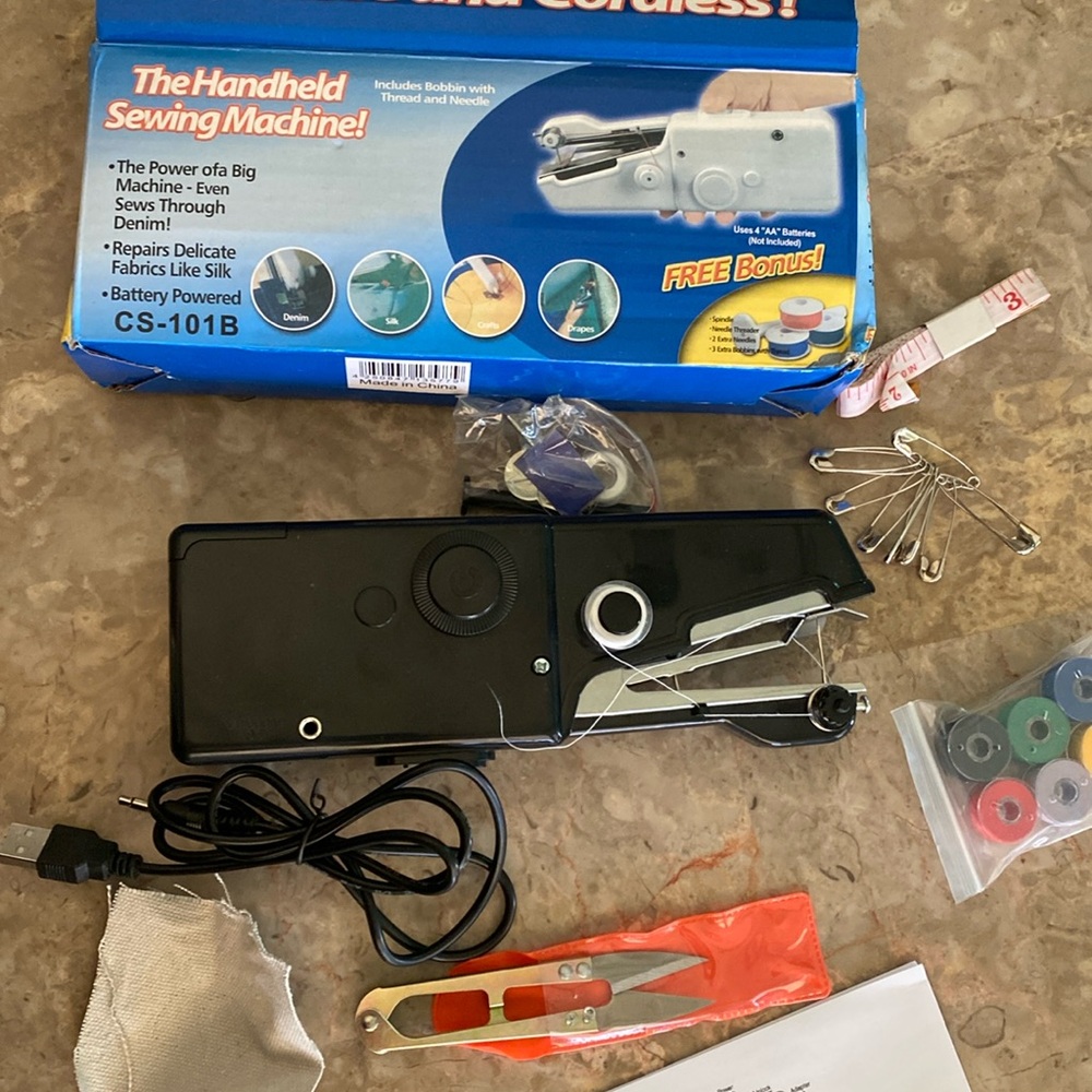 Handy Stitch handheld sewing machine